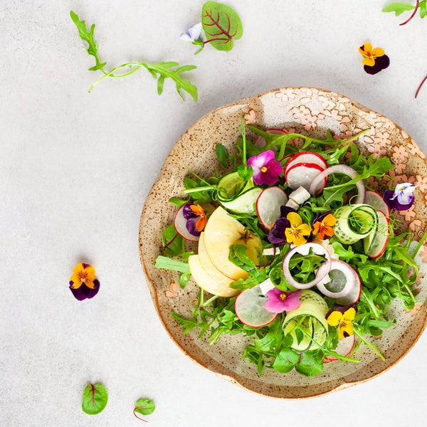 Fresh salad with edible flowers