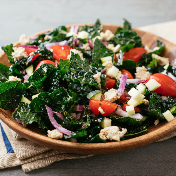 Fresh kale salad in bowl.