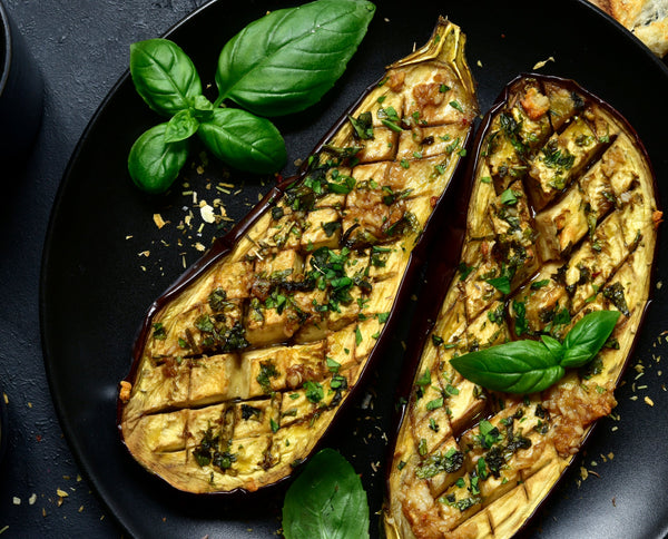 Grilled eggplant with herbs on plate