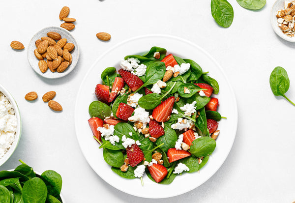Fresh spinach strawberry salad overhead