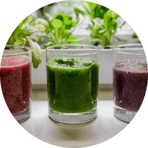 Three healthy colorful fruit smoothies