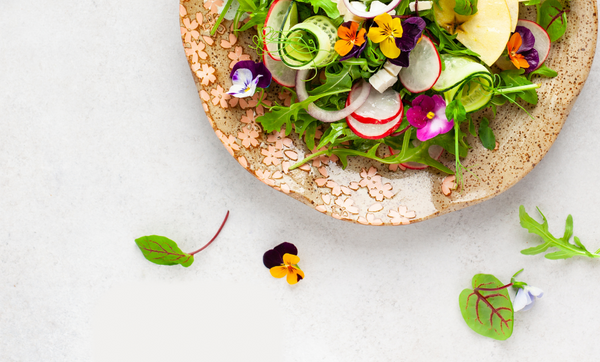 Fresh salad with edible flowers